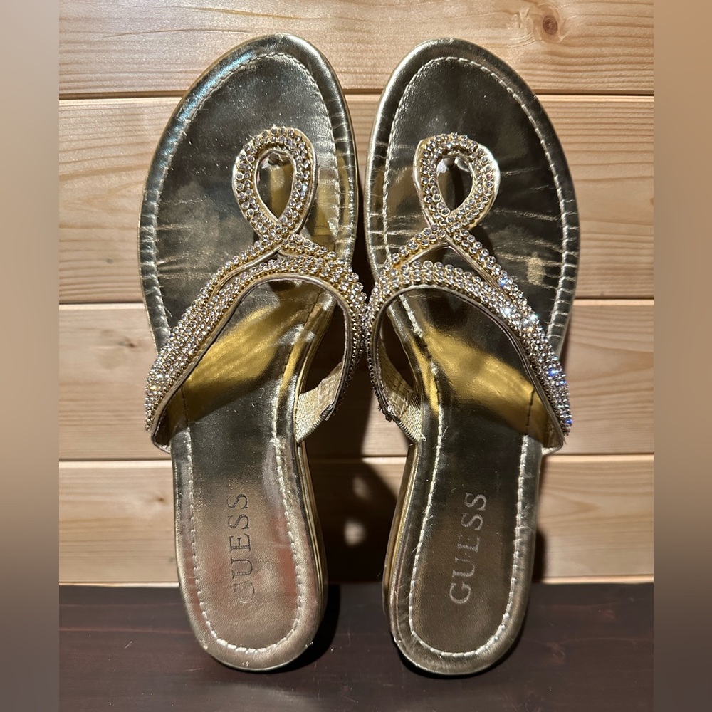Gold Guess rhinestone flat sandals size 7.